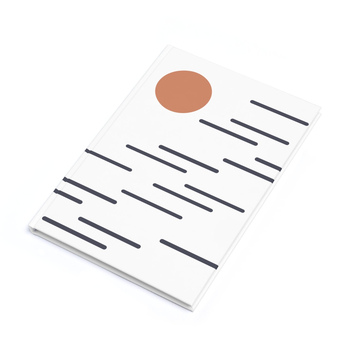 Notebook with a brown circle on the cover against a white background