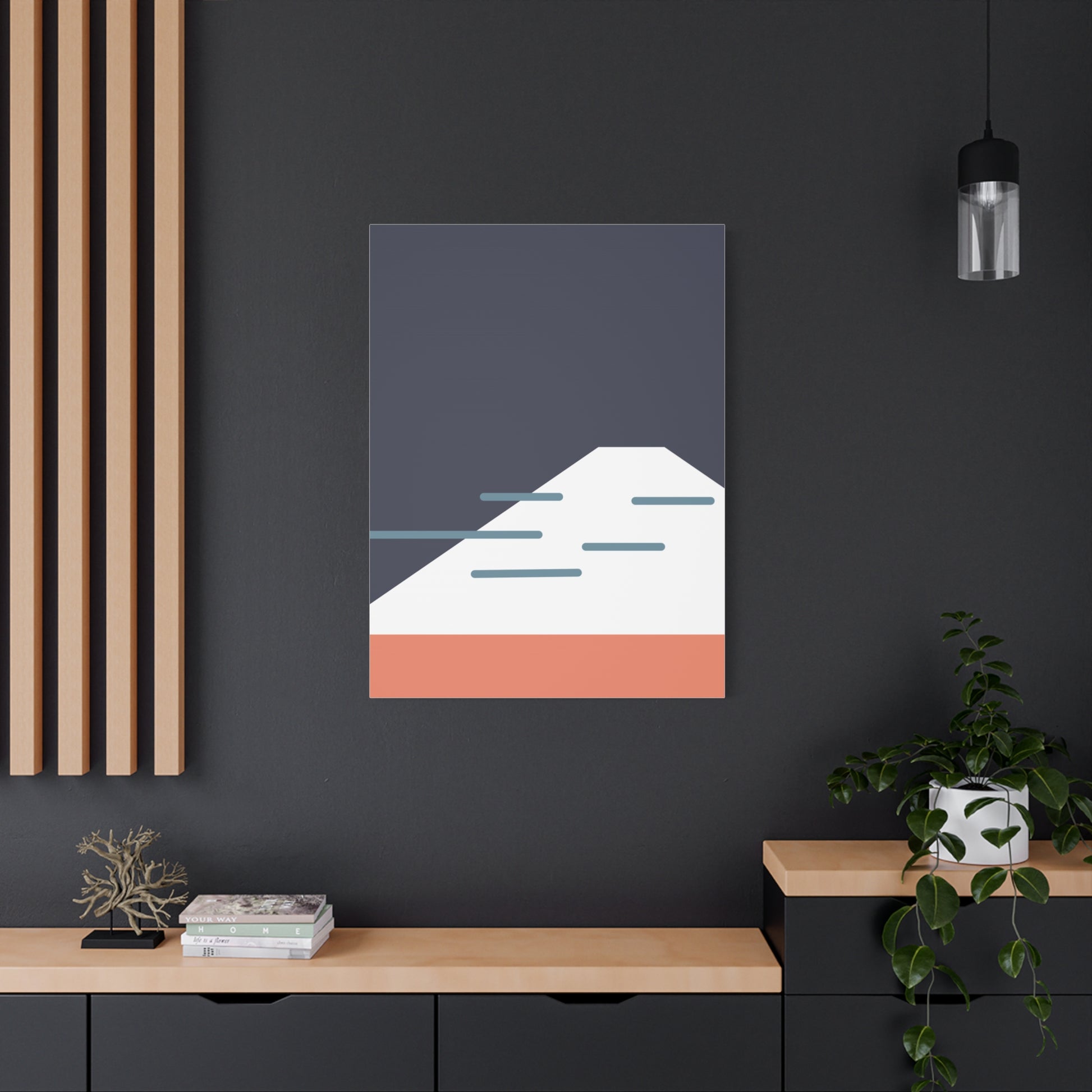 Framed abstract art piece on a dark wall with wooden shelves and decor.