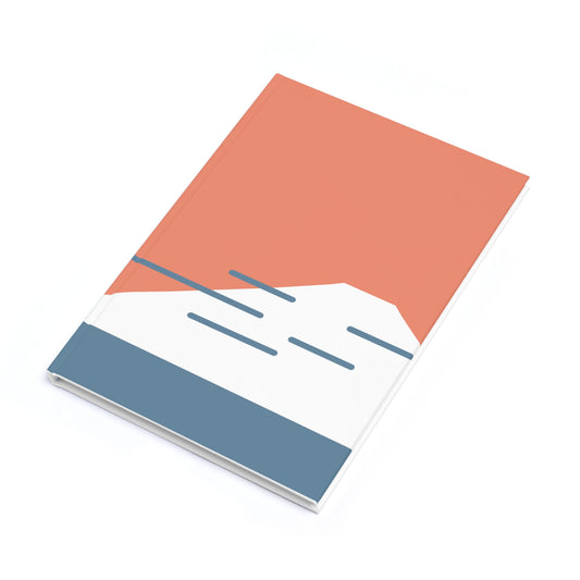 Notebook with a coral top cover, white middle section, and blue bottom cover on a white background