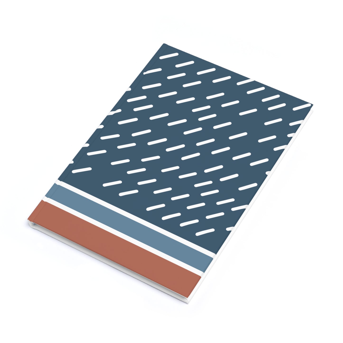 Notebook with a blue and white patterned cover on a white background