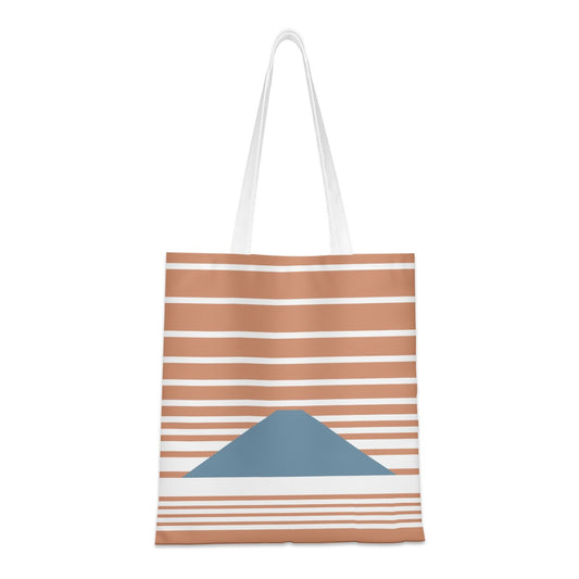 Tote bag with brown and white stripes and a blue pocket on a white background