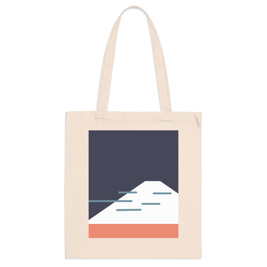 Beige tote bag with a mountain design on a white background