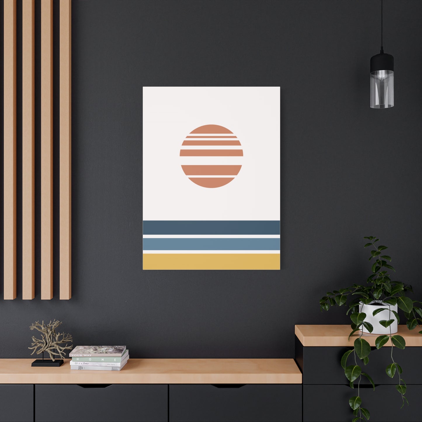 Modern interior with a framed abstract art piece on a dark wall.