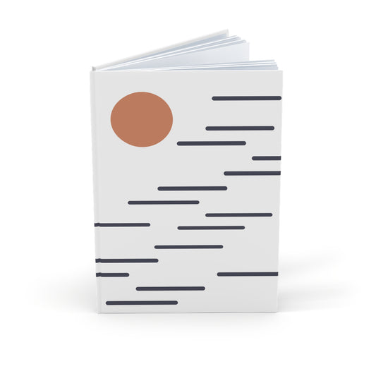 Notebook with a brown circle and black line pattern on a white background