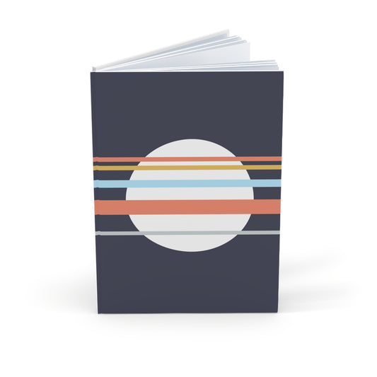 Notebook with a circular design featuring horizontal stripes on a dark blue background