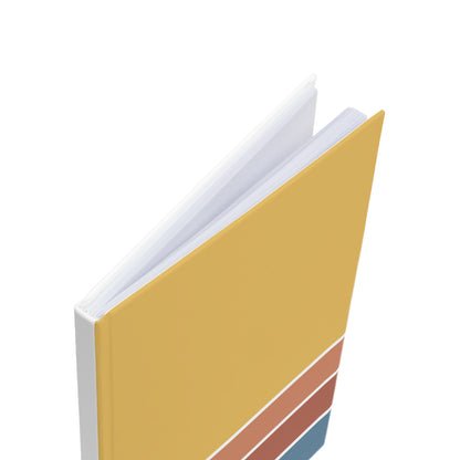 Yellow notebook with a white cover on a white background