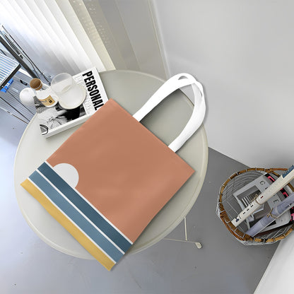 Brown tote bag with white handles on a round table