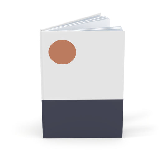 Notebook with a brown circle on a white background