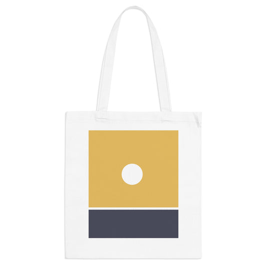 White tote bag with a mustard yellow and navy blue design on a white background