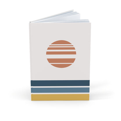 Notebook with a sun design and horizontal stripes on a white background