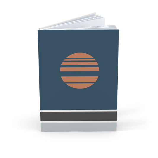 Notebook with a circular design on a blue cover against a white background
