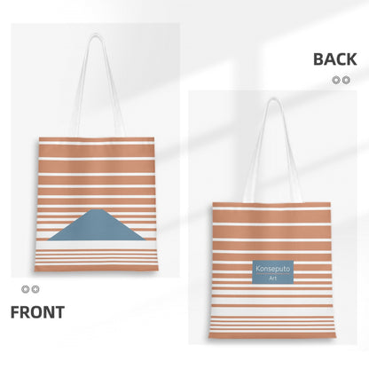 Tote bag with striped design on front and back, featuring a mountain and brand name.