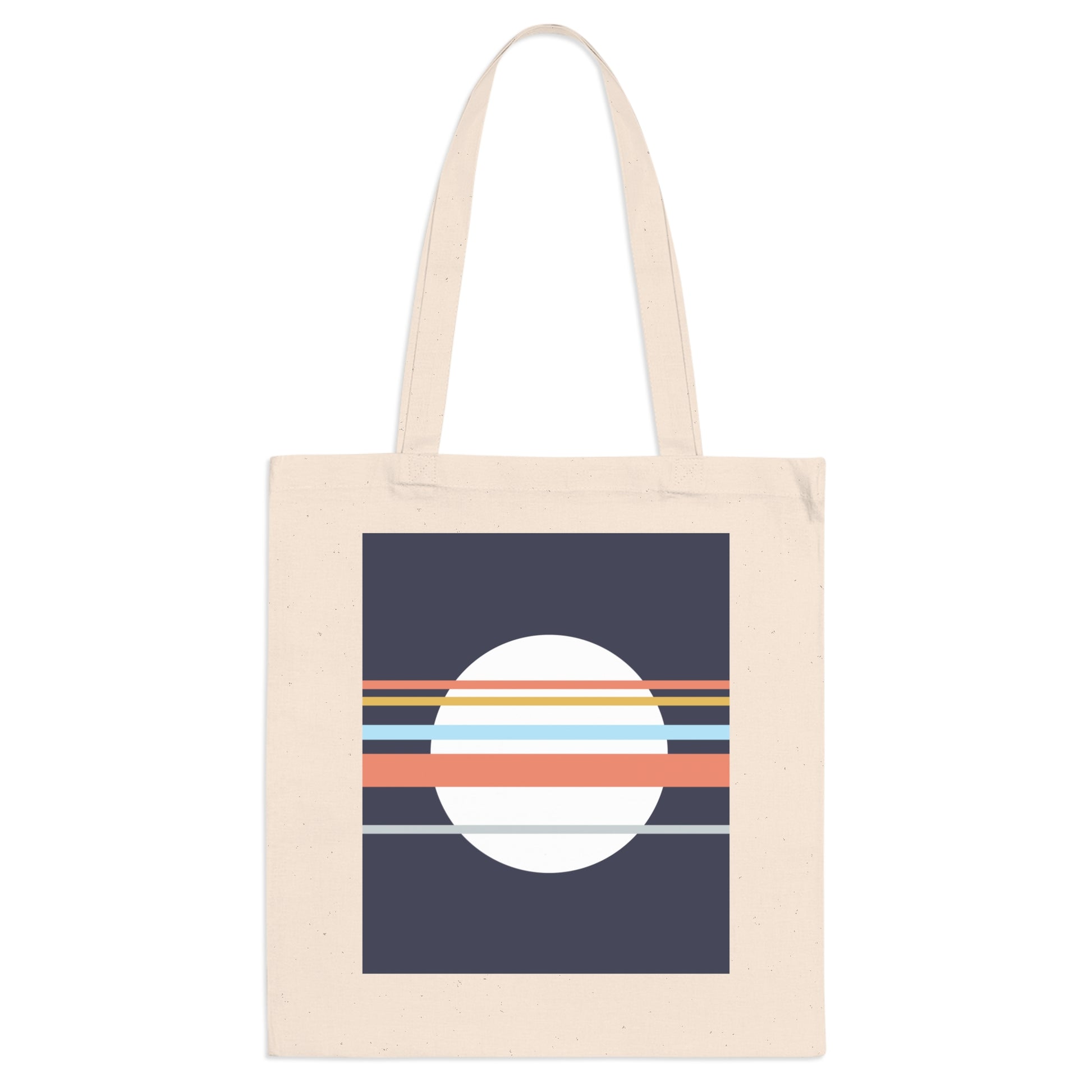 Beige tote bag with a geometric design featuring a white circle and orange stripes on a navy background.