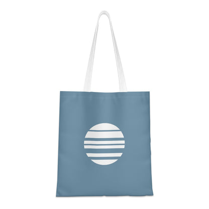 Blue tote bag with a white circular design on a white background