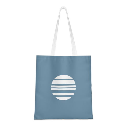 Blue tote bag with a white circular design on a white background