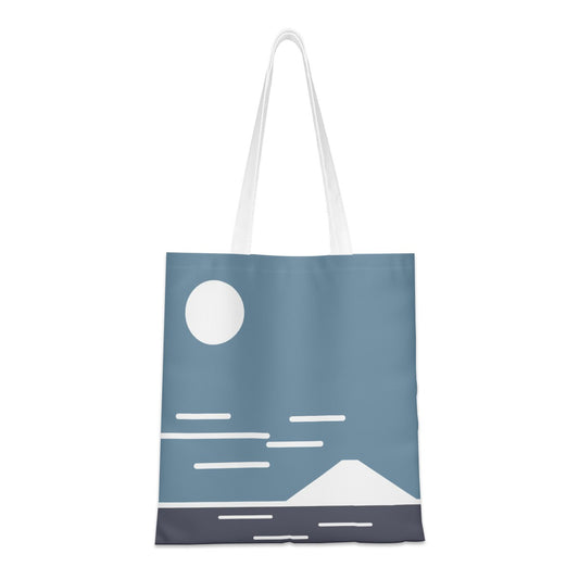 Tote bag with a minimalist design of a mountain and moon on a blue background