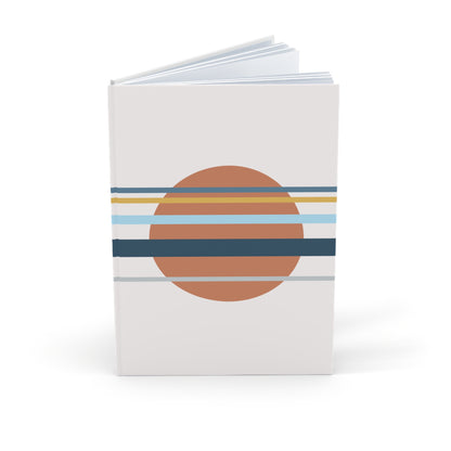 Notebook with a circular design featuring horizontal stripes on a white background