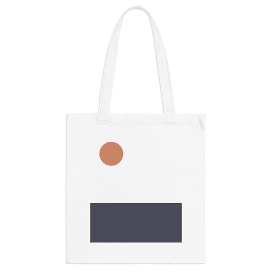White tote bag with a brown circle and black rectangle on a white background