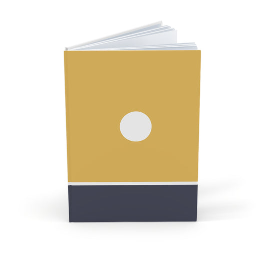 Notebook with a mustard yellow cover, white circle, and navy blue base on a white background