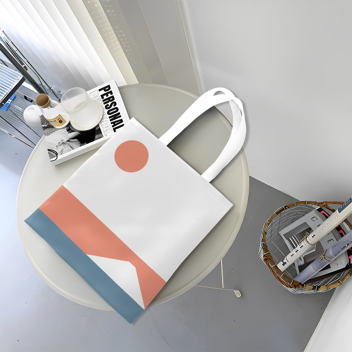 White tote bag with geometric design on a round white table